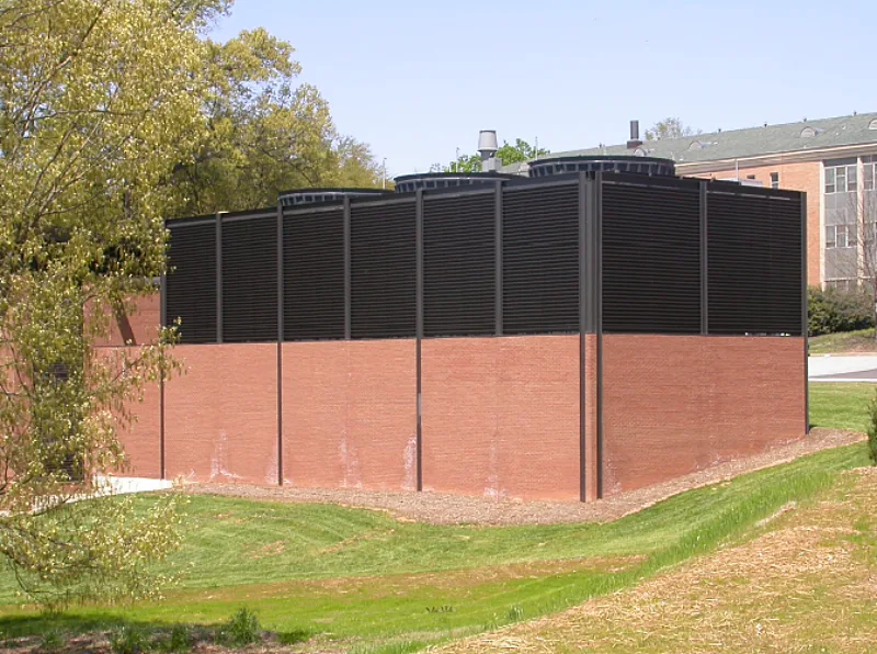 A fence louver system concealing HVAC equipment