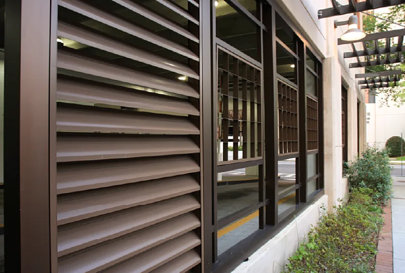 A louver and a grille on a wall