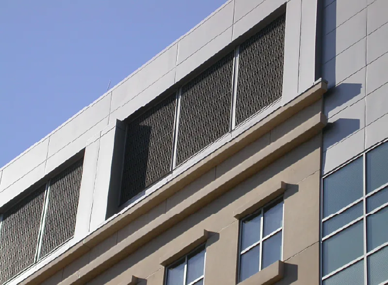 Grilles in an opening on a wall.